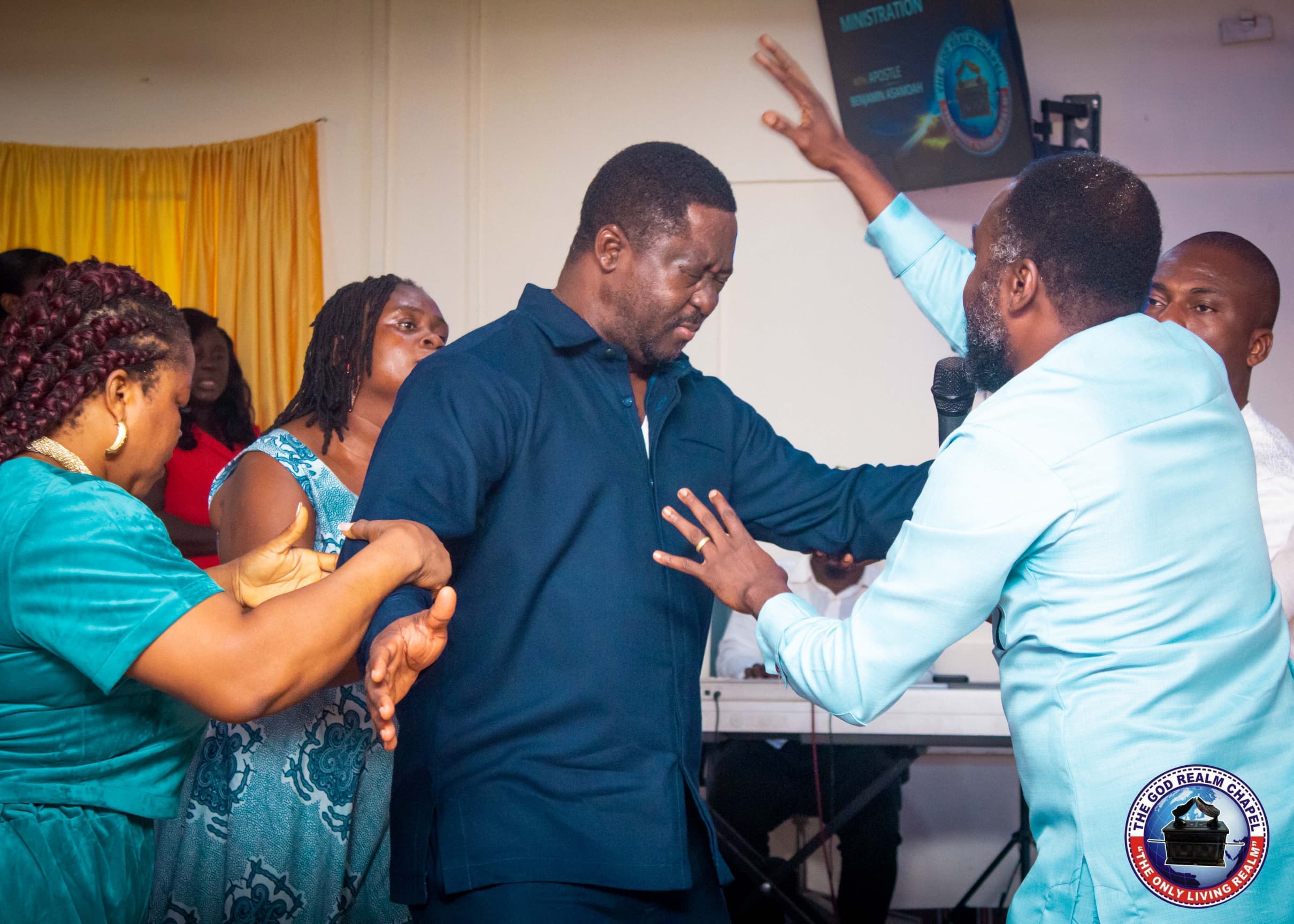 Congregation supporting a member during ministration