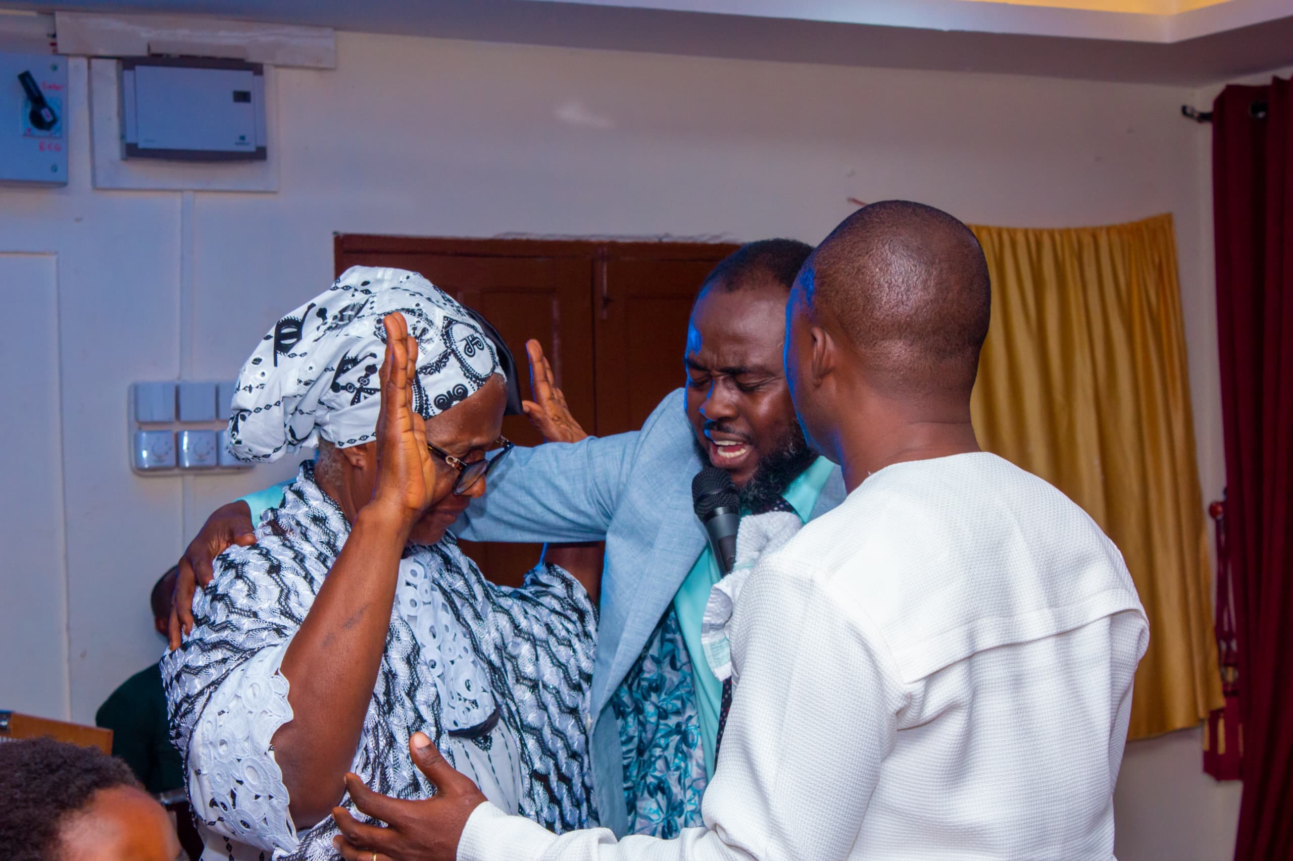 Prayer ministry for an elderly member of the congregation