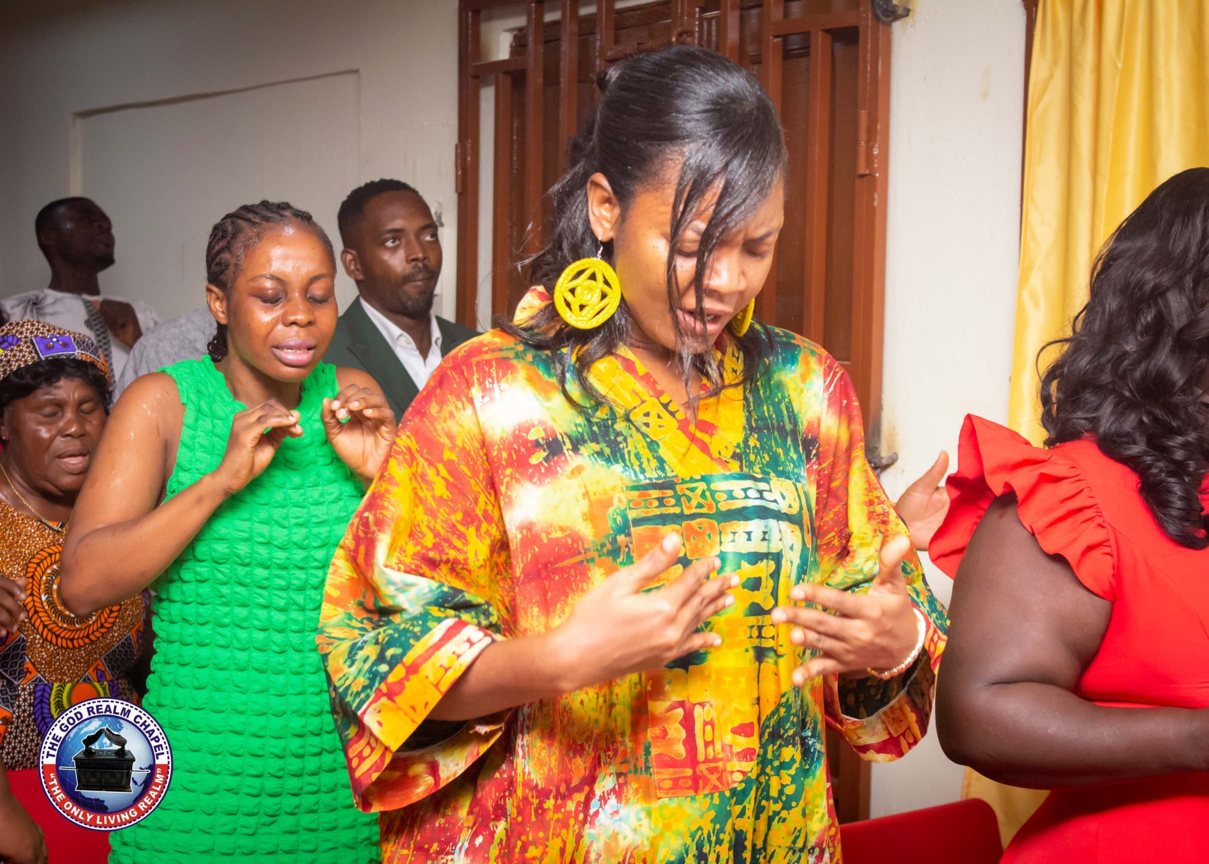 Congregation in fervent prayer during worship