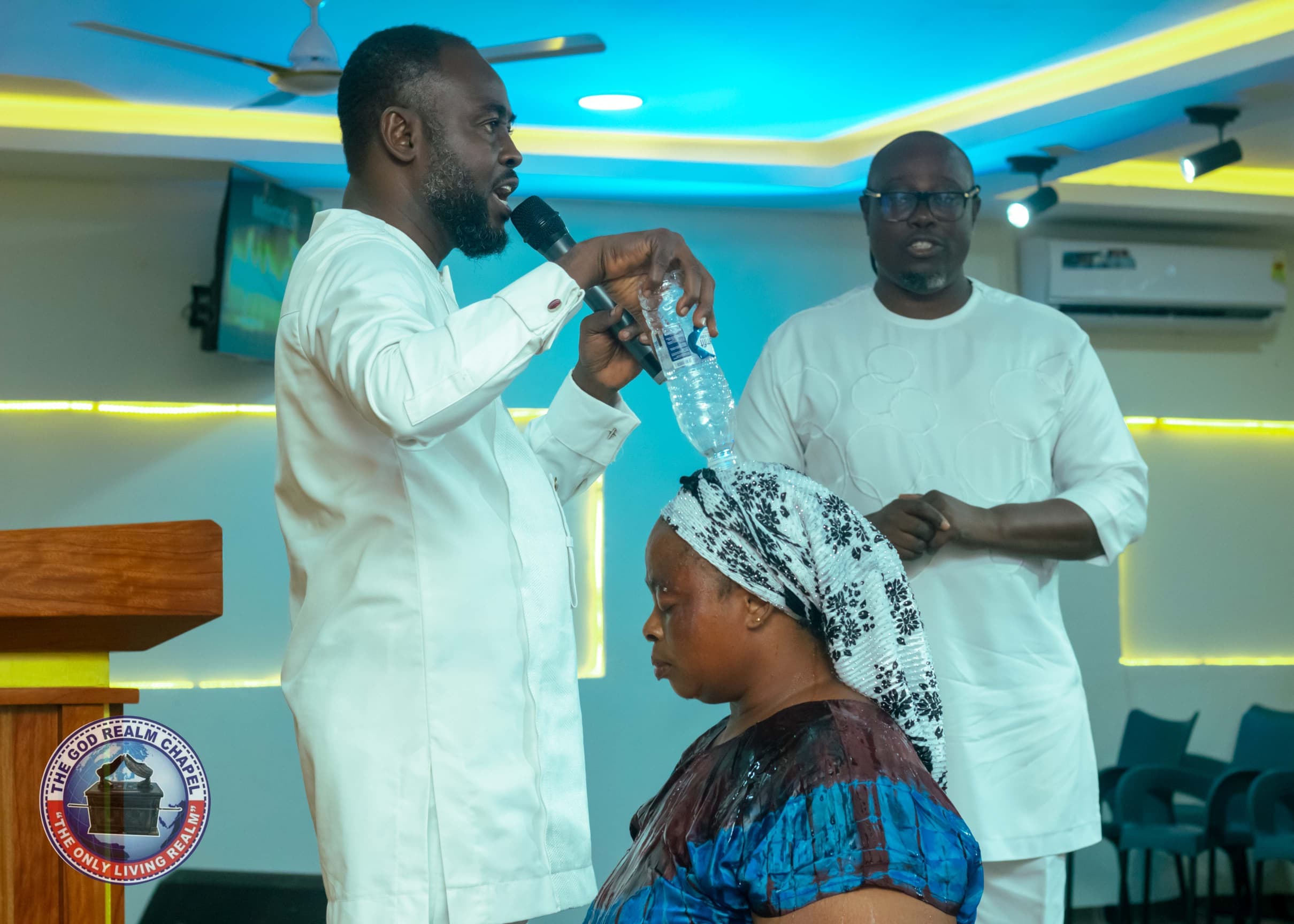 Baptism and water blessing during a service at The God Realm Chapel